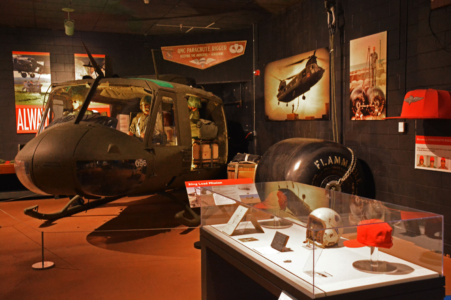 A museum exhibit inside the US Army Quartermaster Museum including a helicopter.